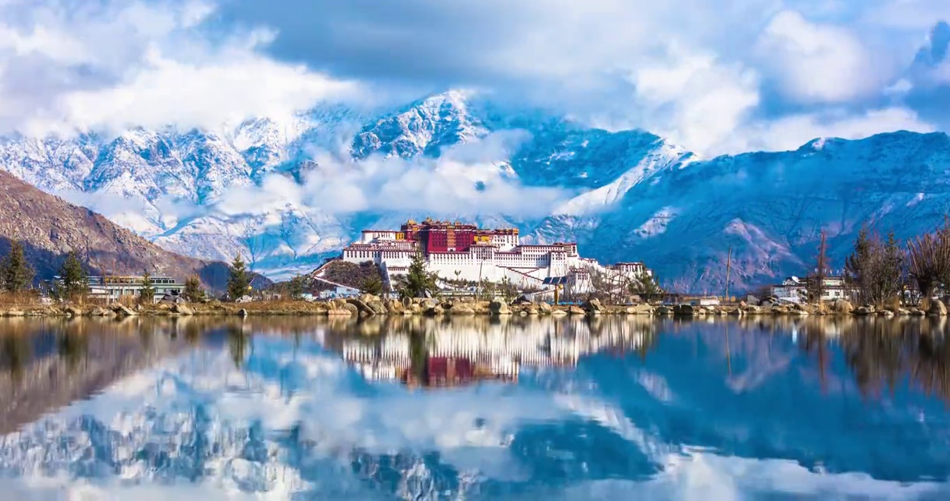 西藏拉薩市城關區南山公園布達拉宮雪景倒影白天光影延時視頻素材