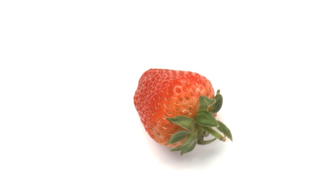 一个草莓旋转特写视频下载