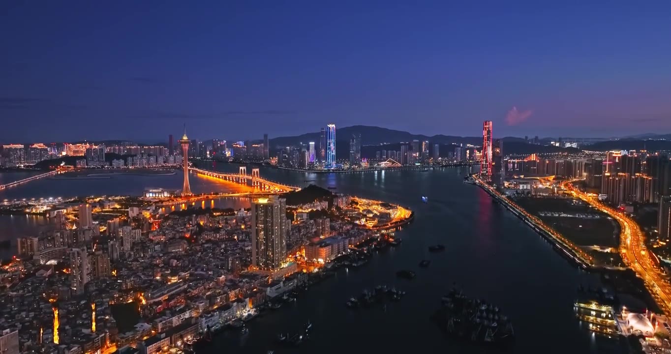 航拍澳门和珠海城市建筑风光在夜晚视频素材