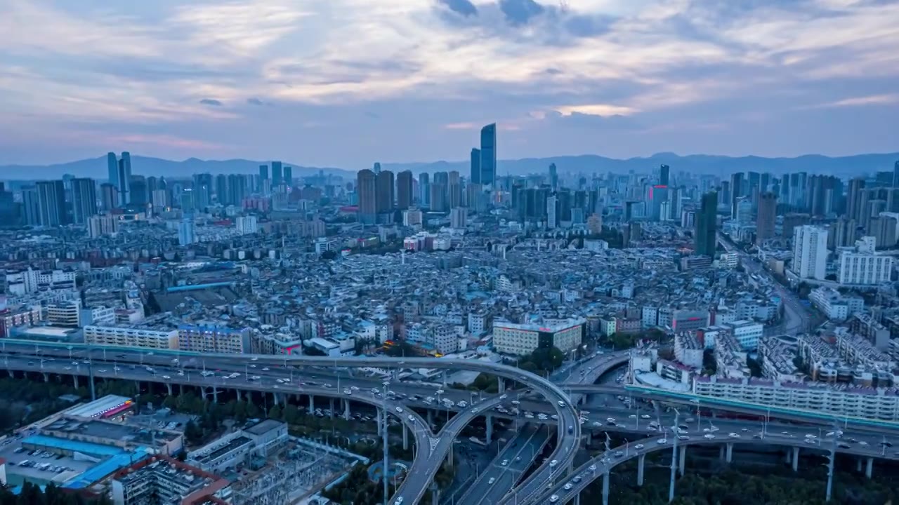 8K昆明城市CBD天际线晚霞航拍延时视频素材