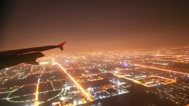 飞机上的城市夜景4k延时视频素材