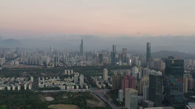 航拍深圳市福田罗湖区城市建筑群日落景观视频素材