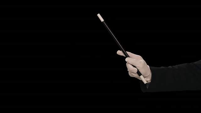 MS魔术师的手像魔杖一样垂直摆动视频下载