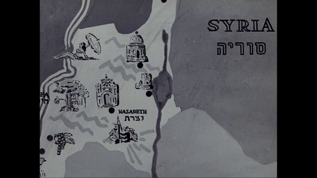 一名男子指着以色列、拉班农和叙利亚/以色列的地图视频素材