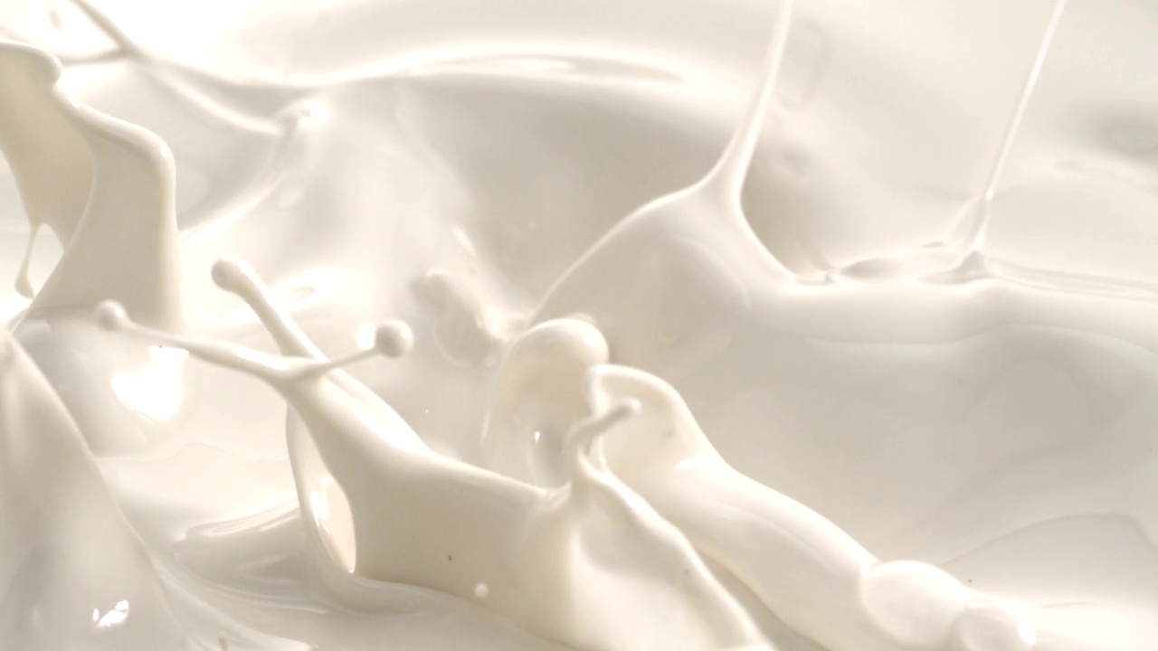 奶油牛奶飛濺微距拍攝幻影相機視頻素材
