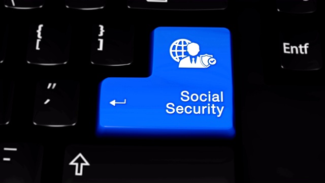 电脑键盘上的社会保障旋转按钮。视频素材