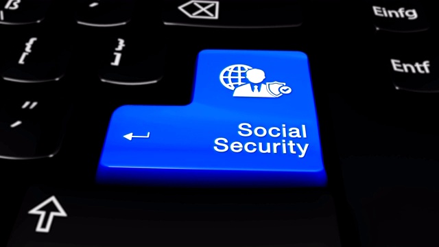 电脑键盘上的社会保障轮动按钮。视频素材