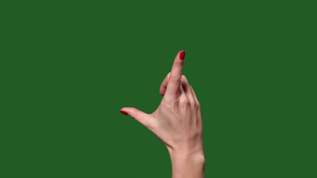 绿色的屏幕。Chromakey。触屏女人的手指手势视频下载