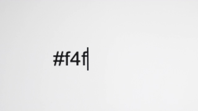一个人在电脑屏幕上输入“#f4f”(Follow for Follow)视频素材