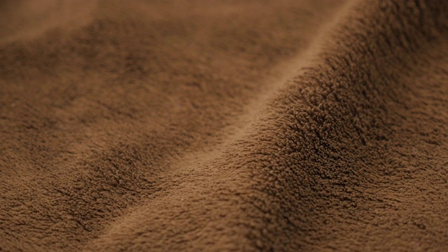 棕色极地织物毯子特写4K视频下载