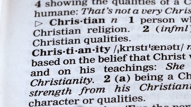 基督教词的定义写在字典中，是主要的宗教之一，信仰视频素材