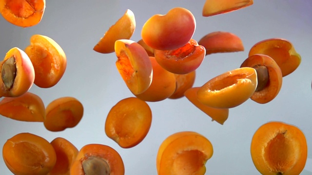 美味的杏子在白色的背景上弹跳视频下载