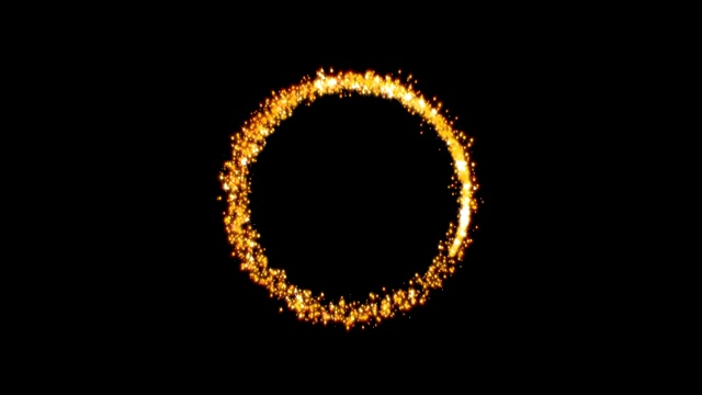 金色闪烁的星尘圆尾闪闪发光的粒子在黑色的背景上。4 k的视频视频下载