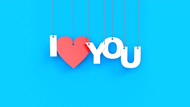 3D动画的文字“我爱你”在一个蓝色的背景视频素材
