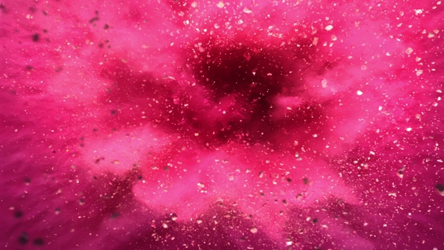 一个充满灰尘和碎片的粉红色表面，以超慢的特写镜头向摄像机喷射视频下载