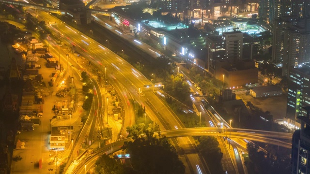 4K时间推移:香港市中心尖沙咀的交通和建筑视频素材