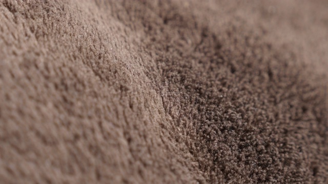 深色极性羊毛涤纶合成纤维暖毯特写4K视频素材