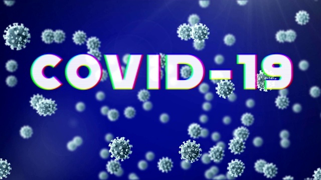Covid-19文本和细胞在蓝色背景下移动视频素材