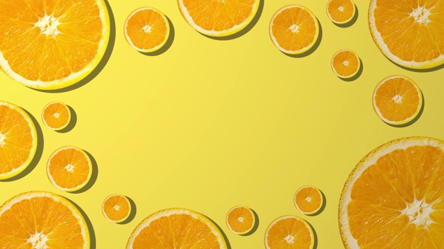 橙色切片与复制空间组成在黄色背景视频素材