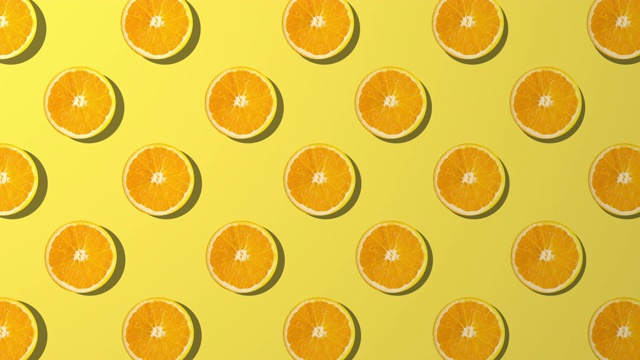 橙色切片纺纱图案，黄色背景视频下载