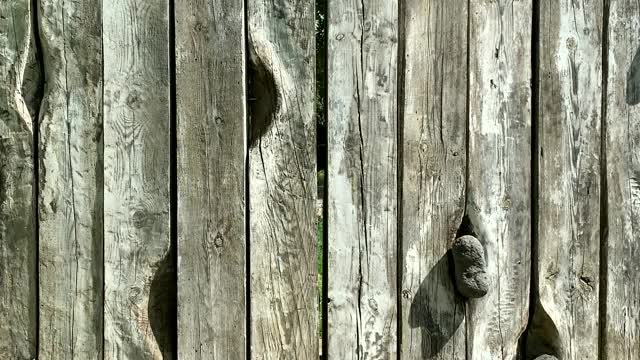 灰色装饰木墙栅栏纹理背景。4 k视频素材