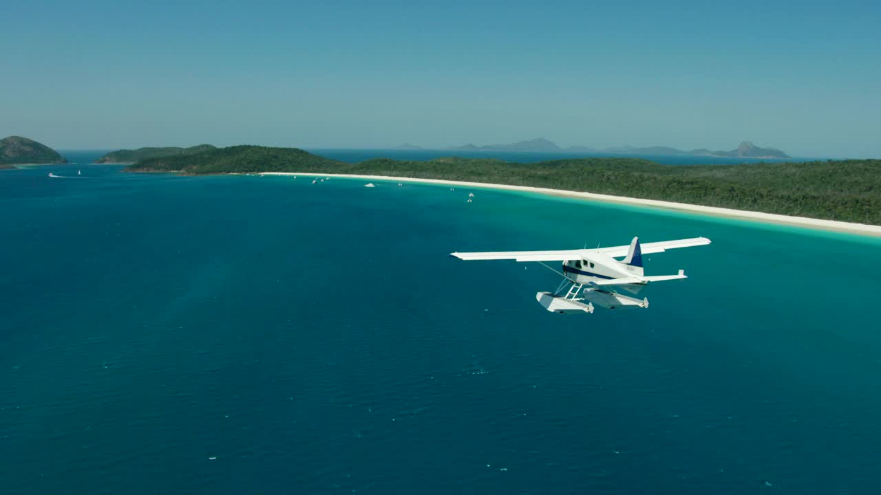 日出空中水上飞机怀特黑文海滩海洋珊瑚礁视频素材