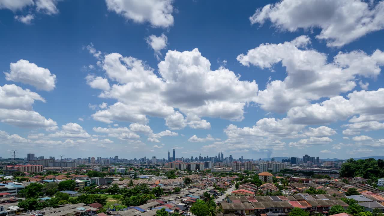 4K吉隆坡市中心移动的云层延时拍摄视频素材