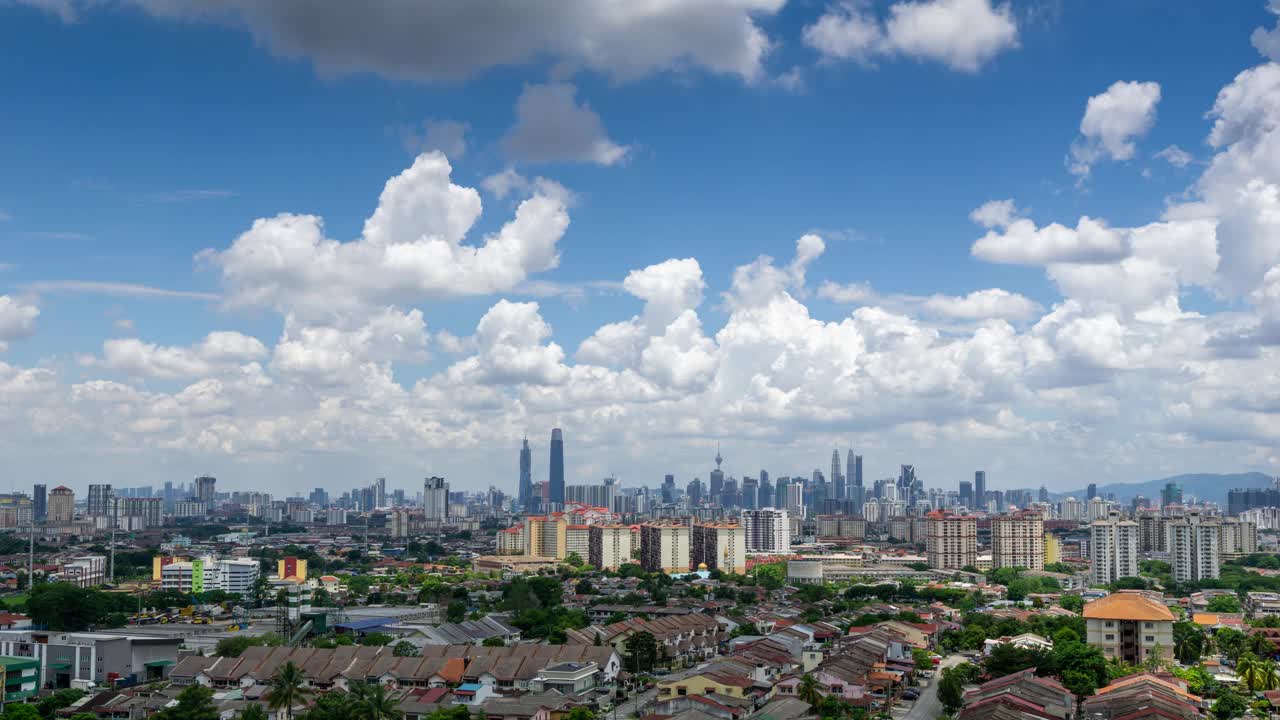 4K吉隆坡市中心移动的云层延时拍摄视频素材