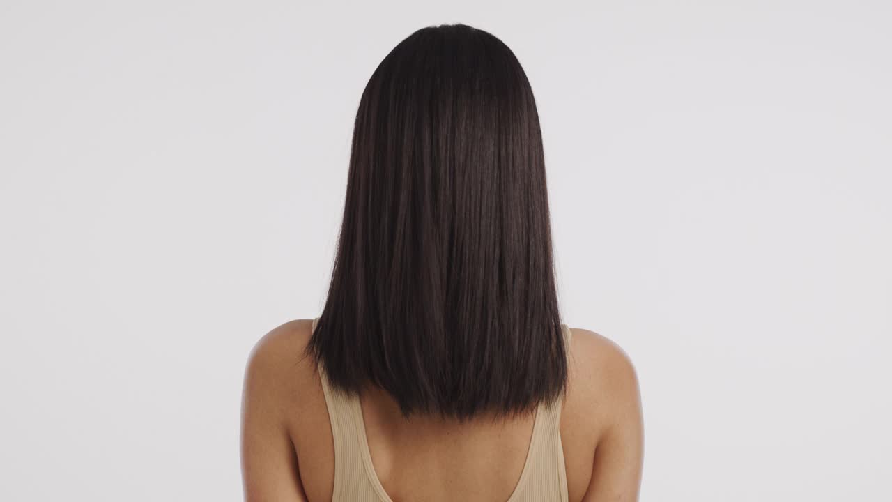 一个有着漂亮棕色头发的女人的4k视频片段视频素材