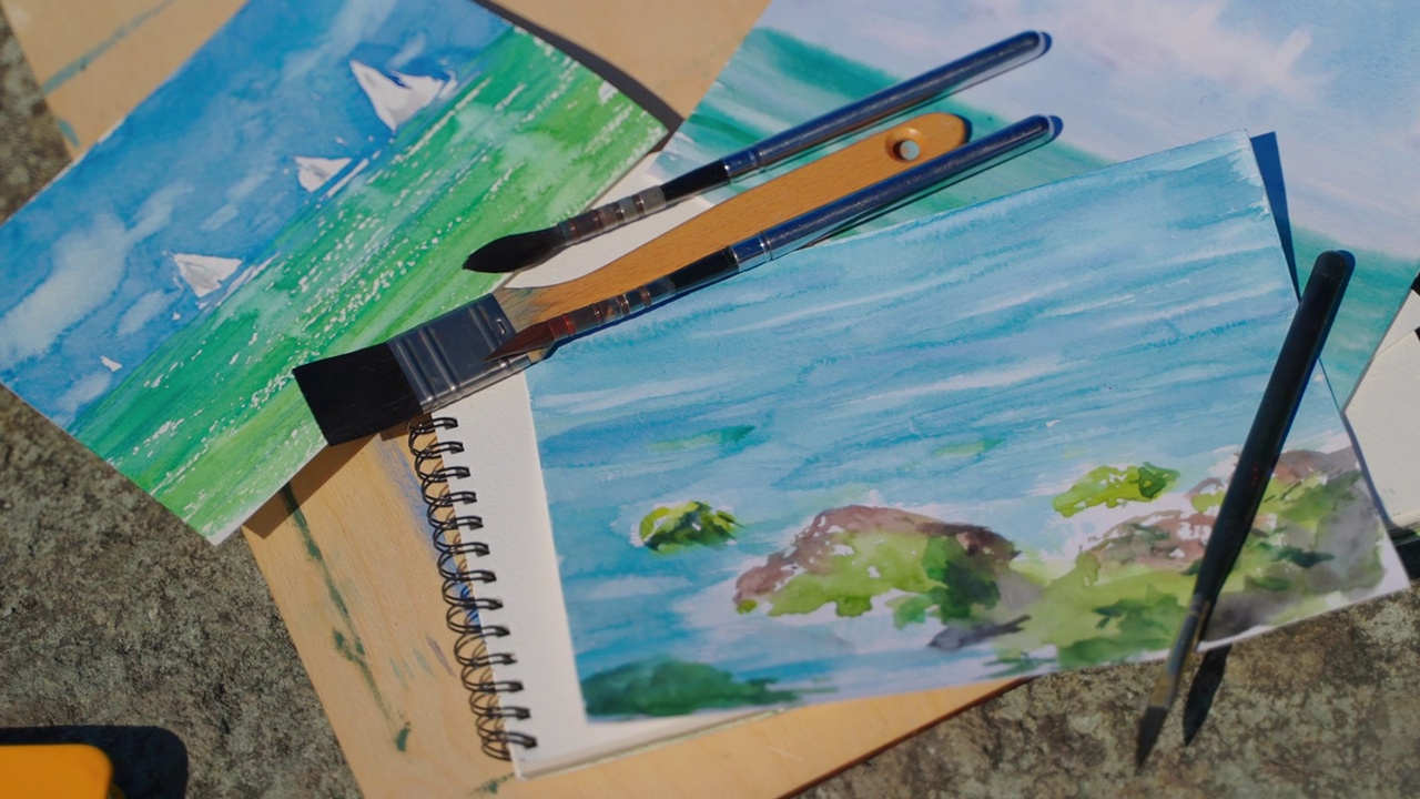 水彩画素描的海景才华横溢的艺术家和画笔视频素材