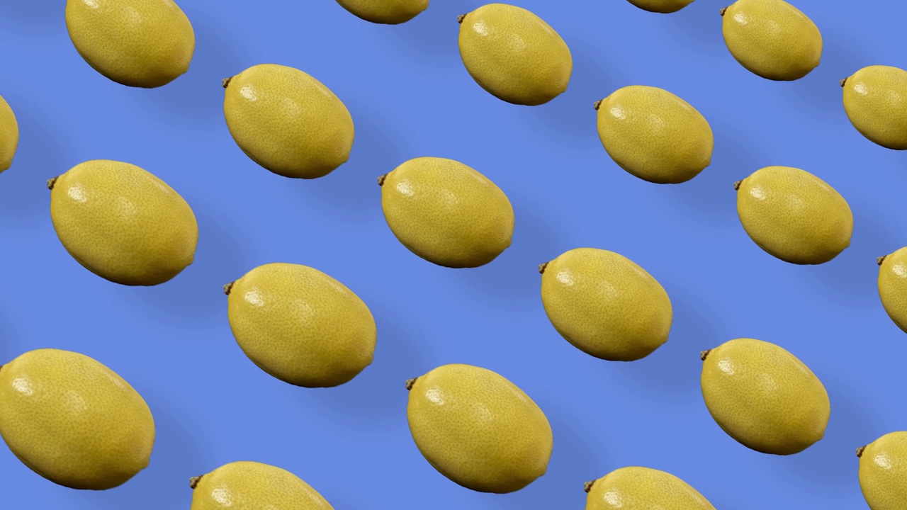 鲜艳的水果图案的新鲜柠檬。无缝柠檬图案。波普艺术设计。现实的动画。4 k视频运动视频素材