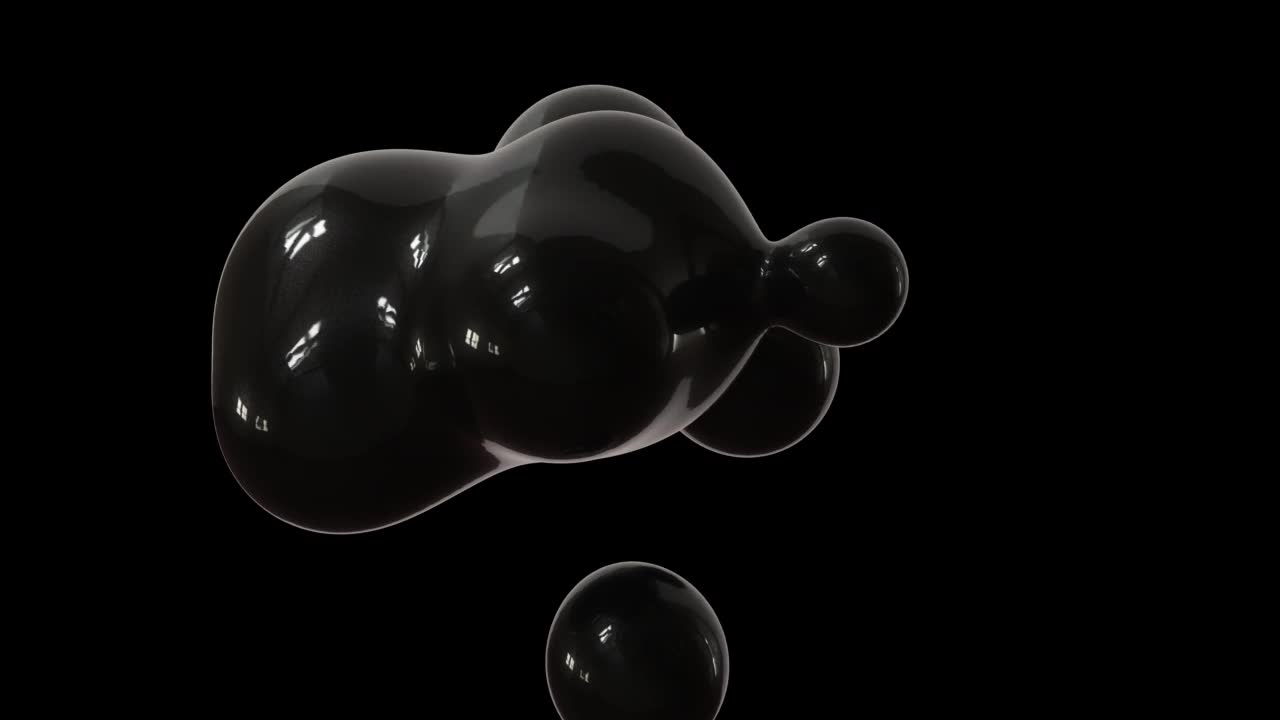 黑色背景上以油滴形式出现的黑色抽象液体在失重状态下移动。视频素材