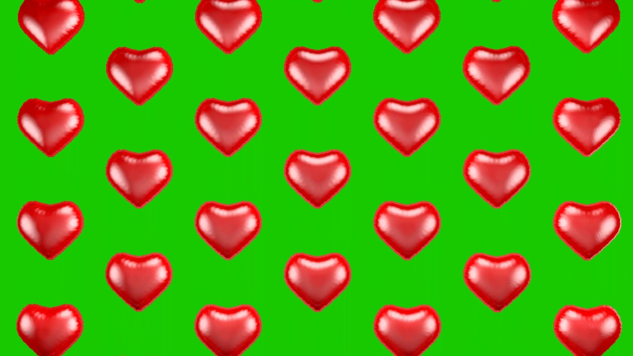红色的红心气球在绿色屏幕上弹出。情人节，2月14日。视频素材
