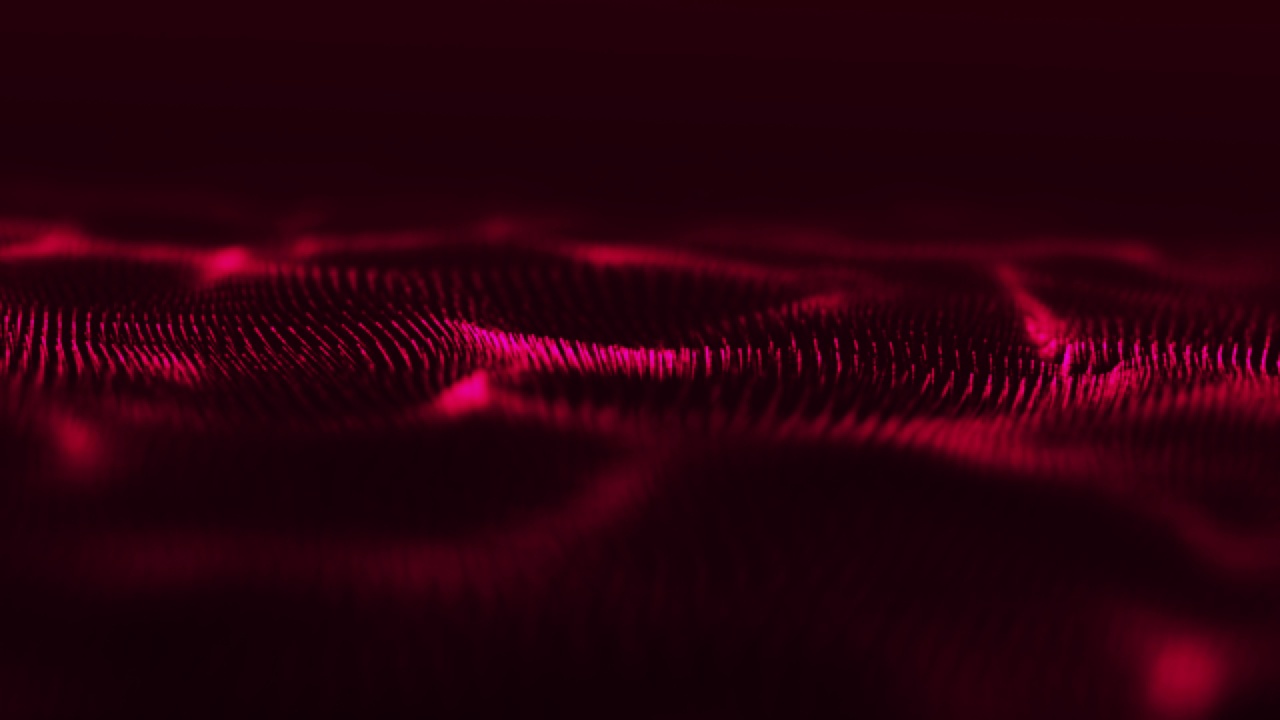摘要红波粒子在暗色背景上具有光效应，与数字技术相连接，创新视频概念视频素材