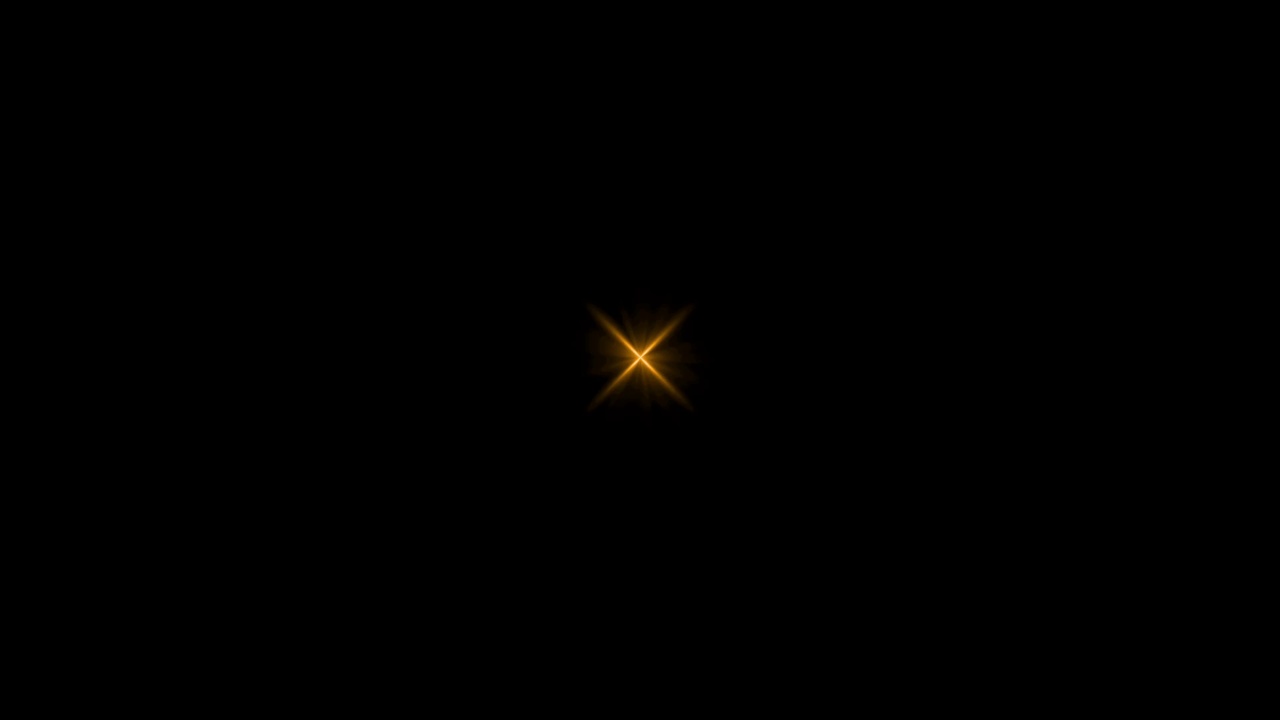现实的橙色光透镜耀斑隔离在黑色背景。视频下载