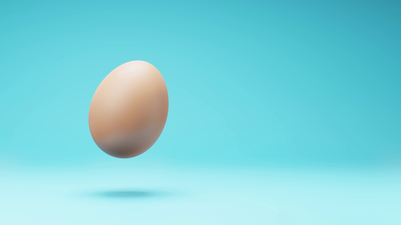 一个鸡蛋旋转工作室蓝色背景视频下载
