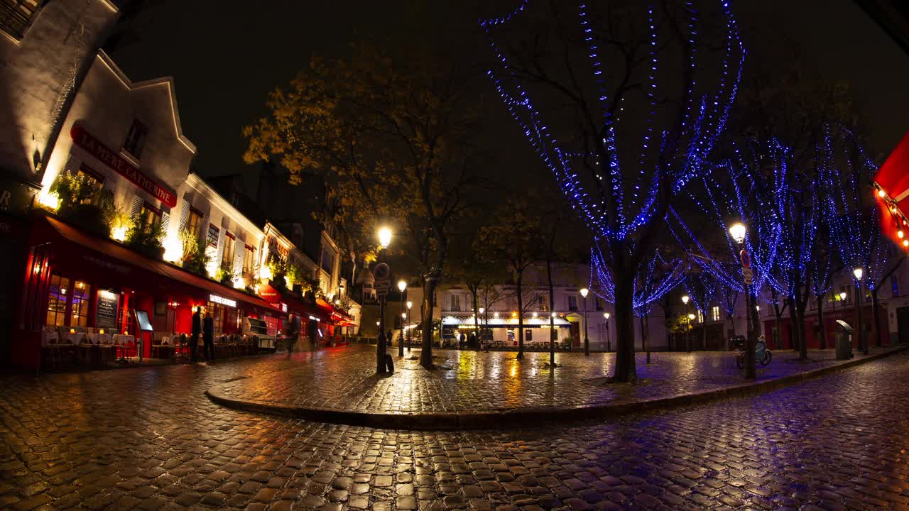 巴黎艺术家广场杜泰尔广场夜间时间胶带冬季灯雨视频下载