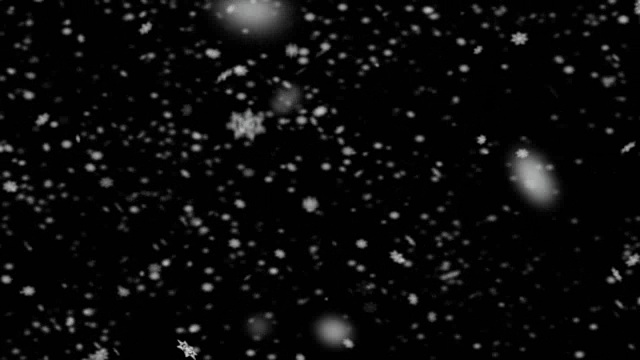 雪花落在黑色的背景上视频下载