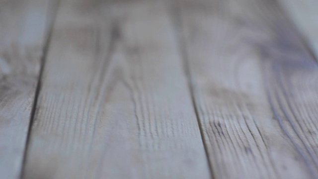 木地板或桌子。滑块运动视频。视频素材