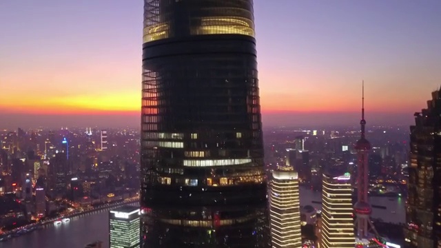 航拍视角下的晴朗天气的上海陆家嘴日落4K高清延时摄影视频素材