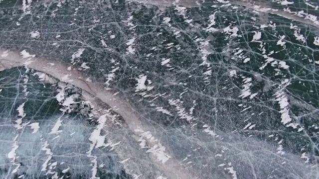 航拍中国新疆帕米尔高原被冰封的喀拉库勒湖视频素材