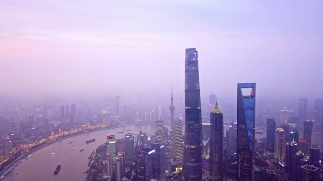 航拍视角下的的上海陆家嘴外滩日落夜景4K高清视频视频素材