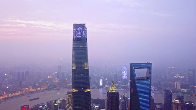 航拍视角下的俯瞰上海陆家嘴夜景4K高清视频视频素材