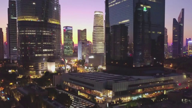 航拍视角下的的上海陆家嘴日落夜景高清视频视频素材