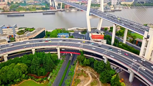 航拍视角下的上海南浦大桥高架桥白昼夜景4K高清视频视频素材