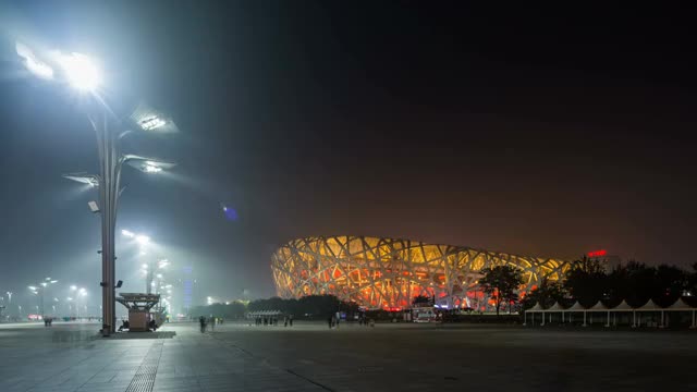推镜头 北京奥林匹克公园鸟巢夜景延时摄影视频素材