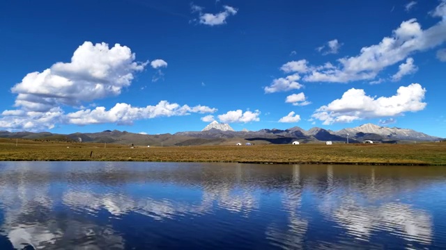 甘孜藏族自治州塔公草原自然风光延时摄影视频素材