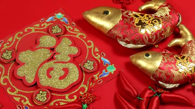 红色背景中国春节新年传统装饰品静物视频素材