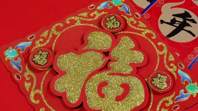 红色背景中国春节新年传统装饰品静物视频素材