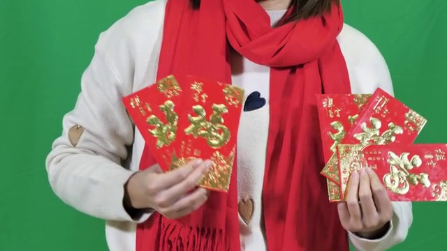 亚洲女士恭贺新年拜年绿幕可抠图 4k高清视频视频下载